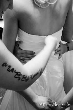 So many hands, ready to help her with one last preparation!