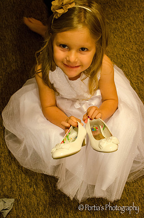 The adorable flower girl with her new shoes!